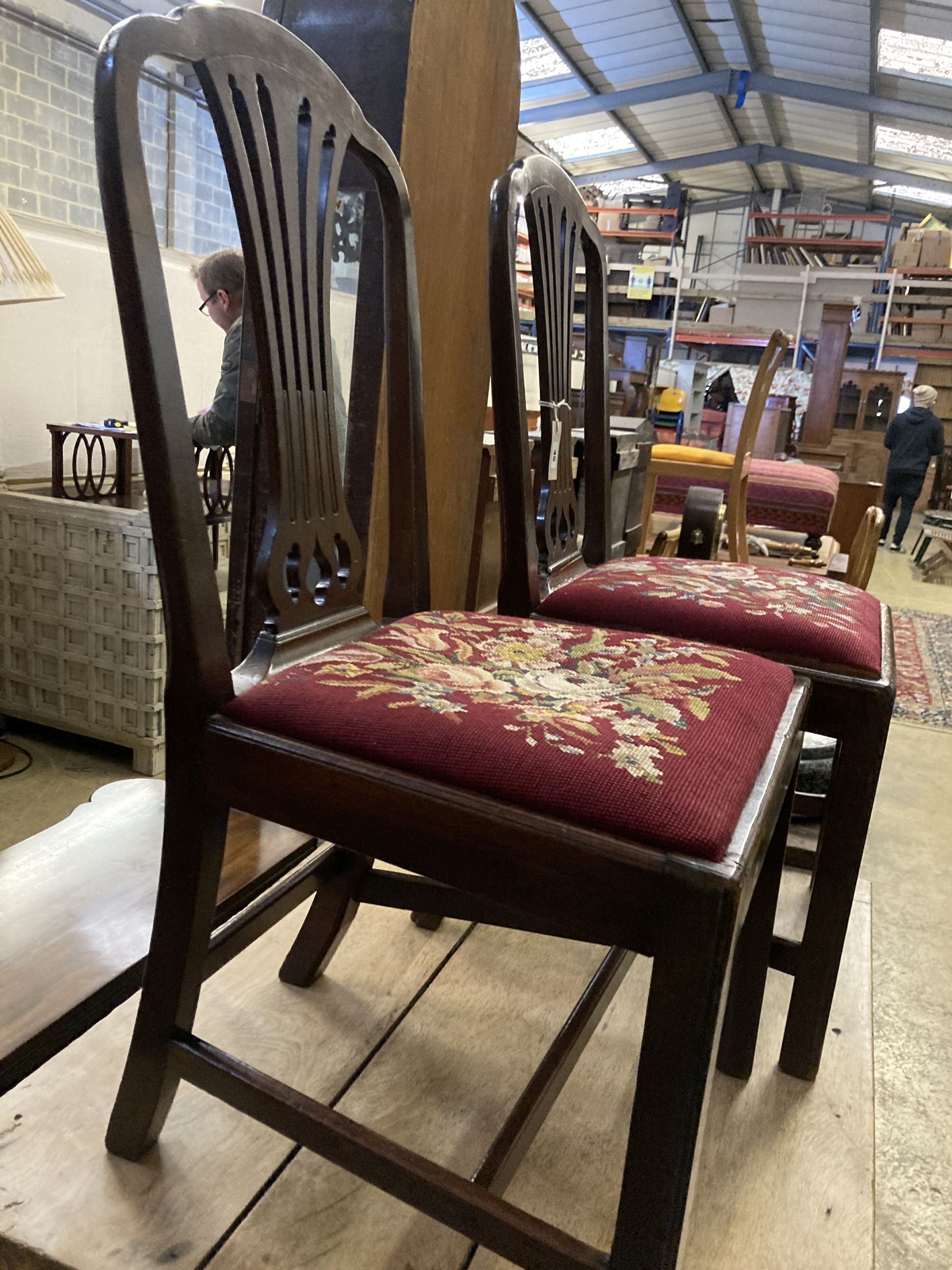 A pair of George III mahogany dining chairs